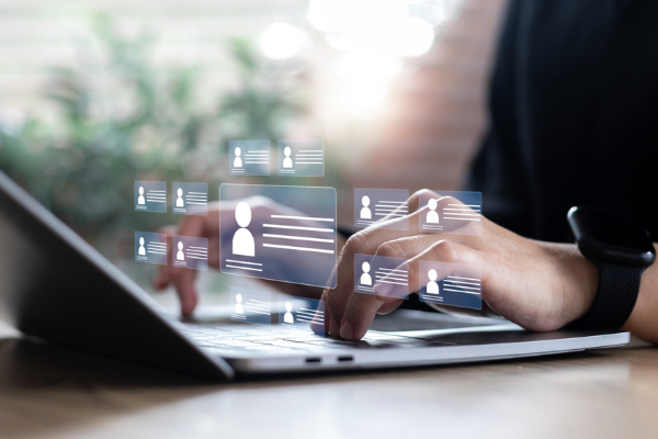 Businesses use digital systems to manage candidate profiles and resumes for recruitment. HR technology and automation for the hiring process.