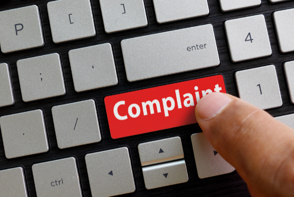 Complaint button shutterstock 1499251934